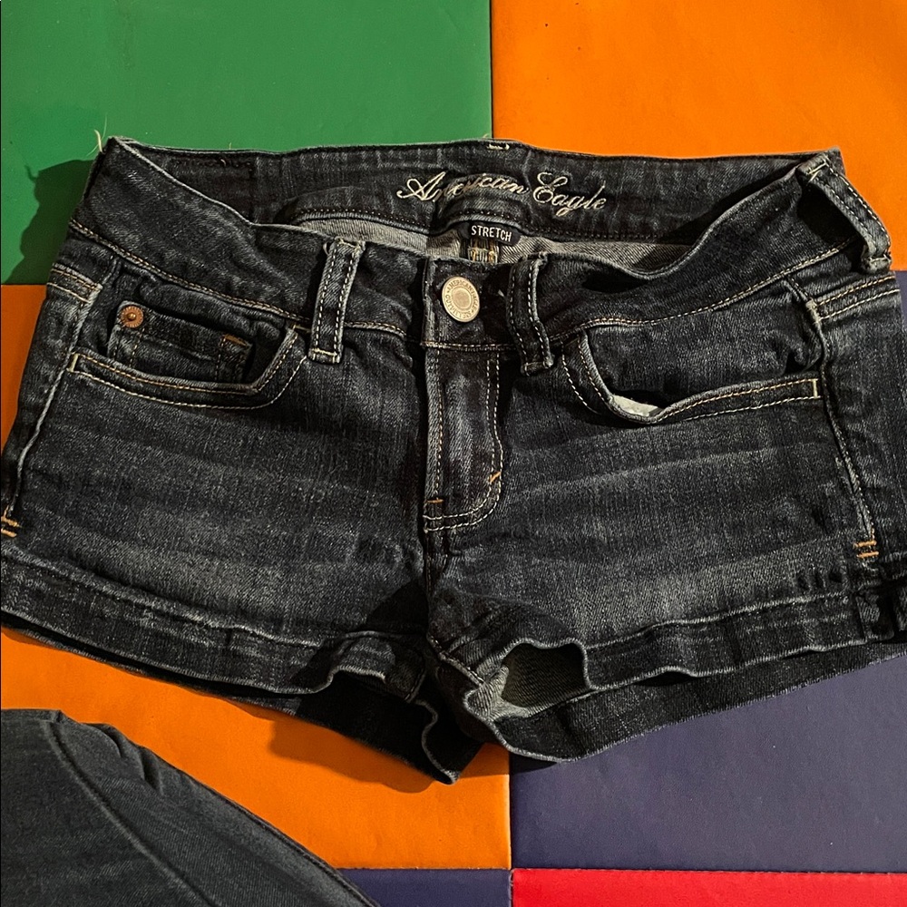 American Eagle Outfitters Dark Blue Jeans with Brown Patch
